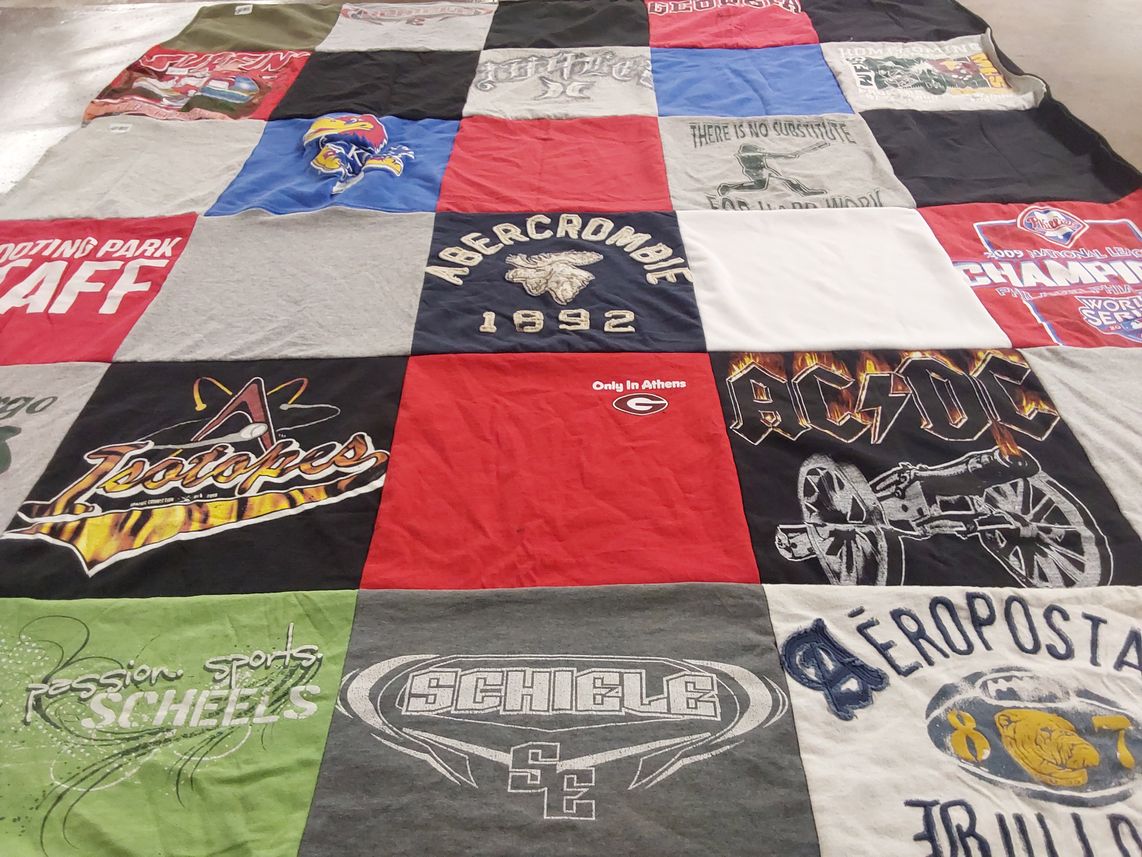 T-shirt quilt featuring potoses by Darla from ND