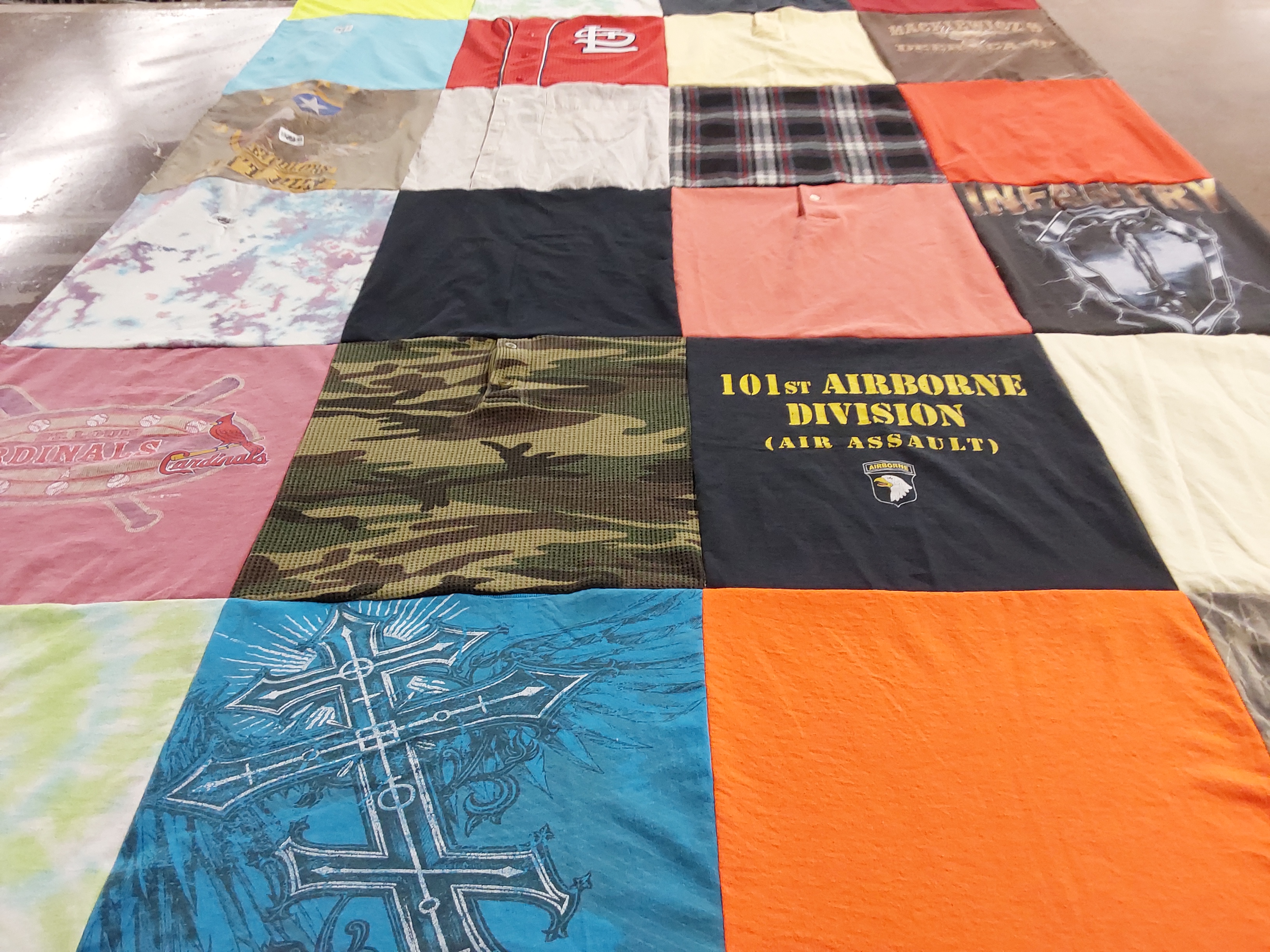 T-shirt quilt with military, sports themes by Belinda from MO
