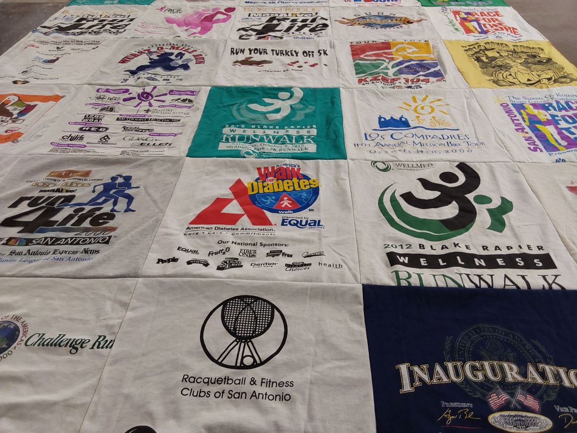 T-shirt quilt with fitness, health themes by Cyndie from TX