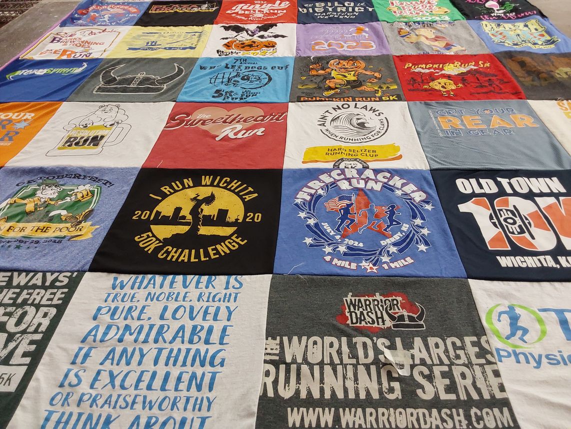 T-shirt quilt with running, fitness themes by Elizabeth from MI