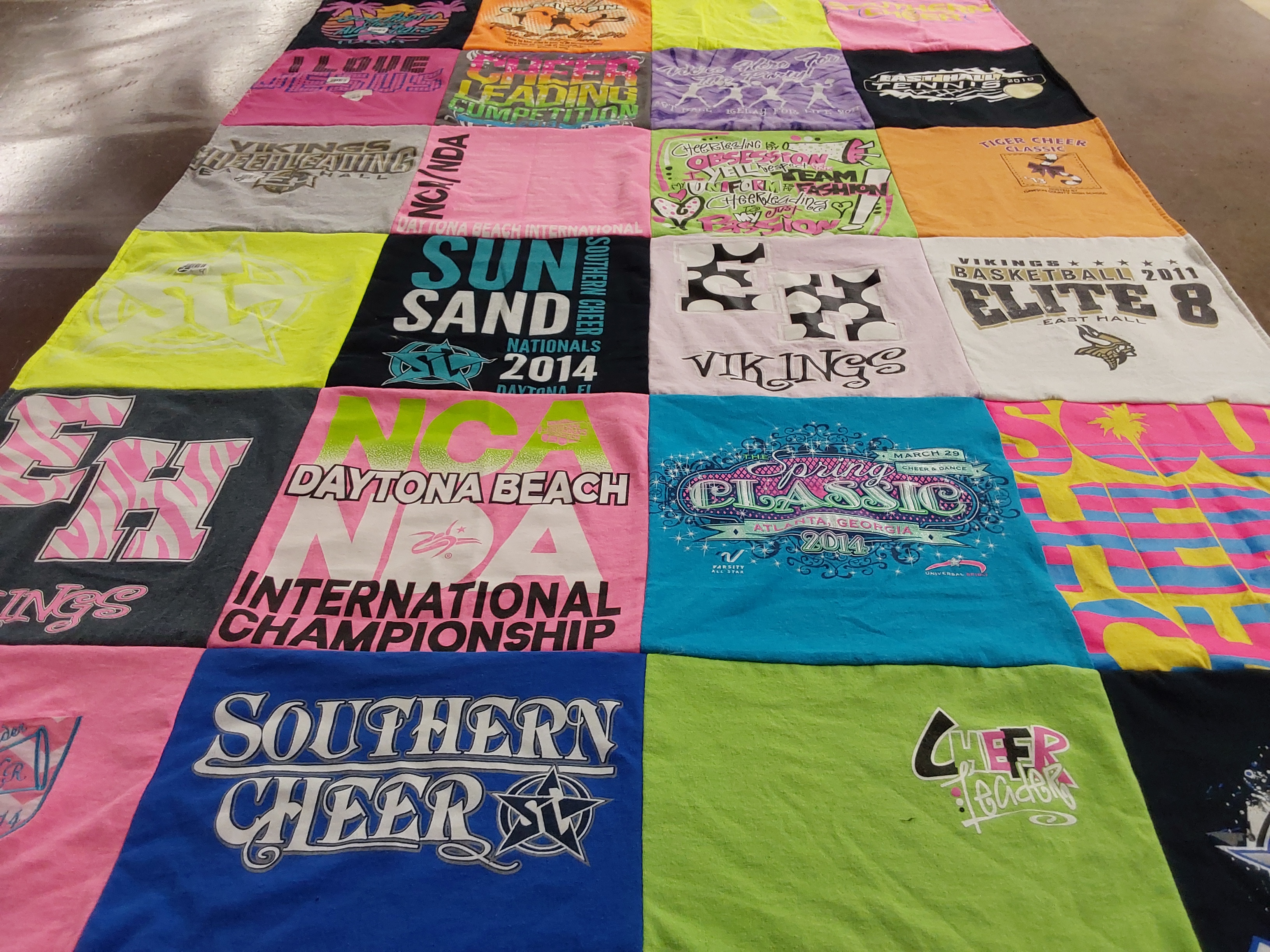 T-shirt quilt featuring vikings, cheerleading team by Lisa from GA