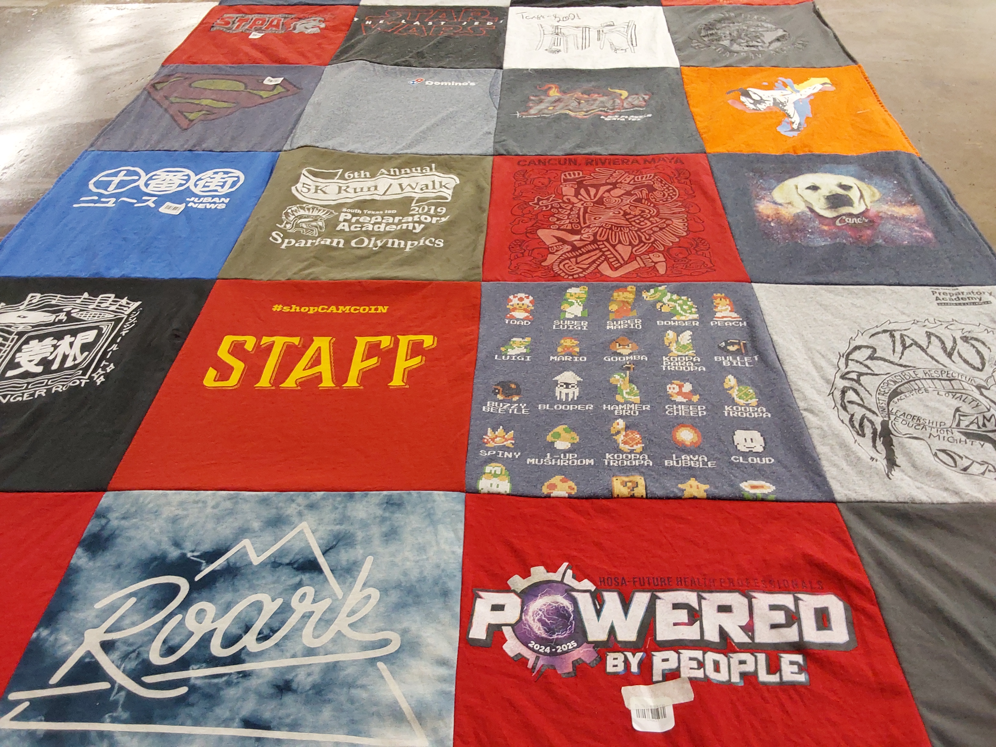 T-shirt quilt from preparatory academy by Laura from TX