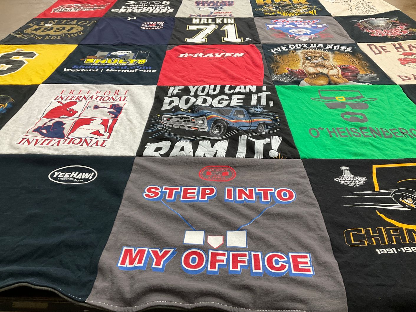 T-shirt quilt with sports themes by Bonnie from PA