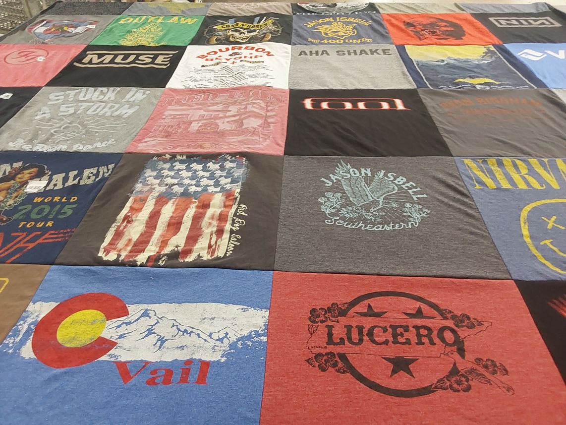 T-shirt quilt with music, concerts themes by Michaela from TX