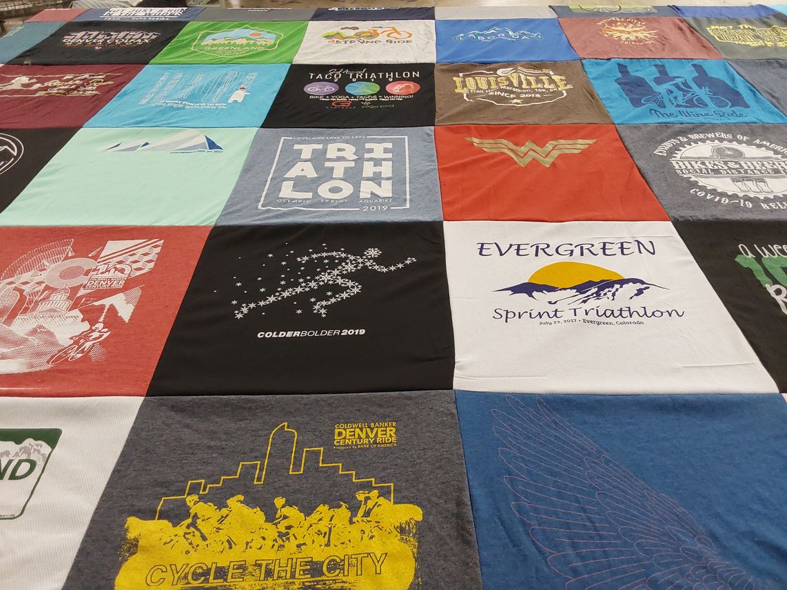 T-shirt quilt with triathlons, cycling themes by Heather from CO