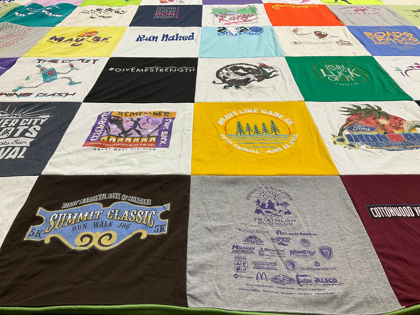 T-shirt quilt with running, triathlon themes by Mary from MT