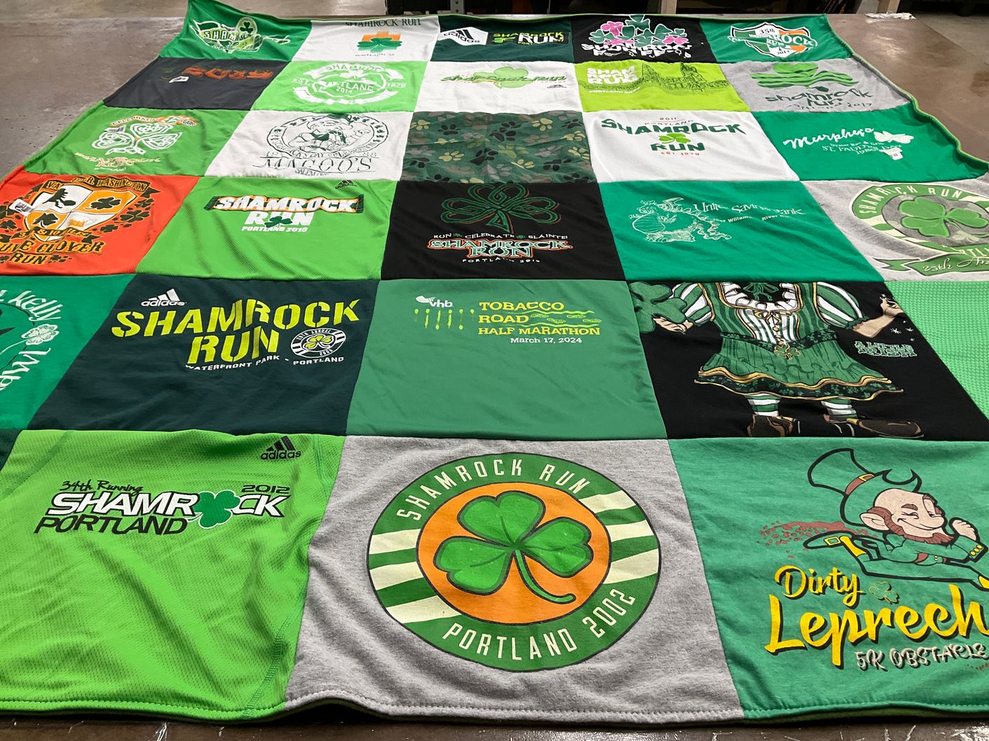 T-shirt quilt with running, marathons themes by Deb from OR