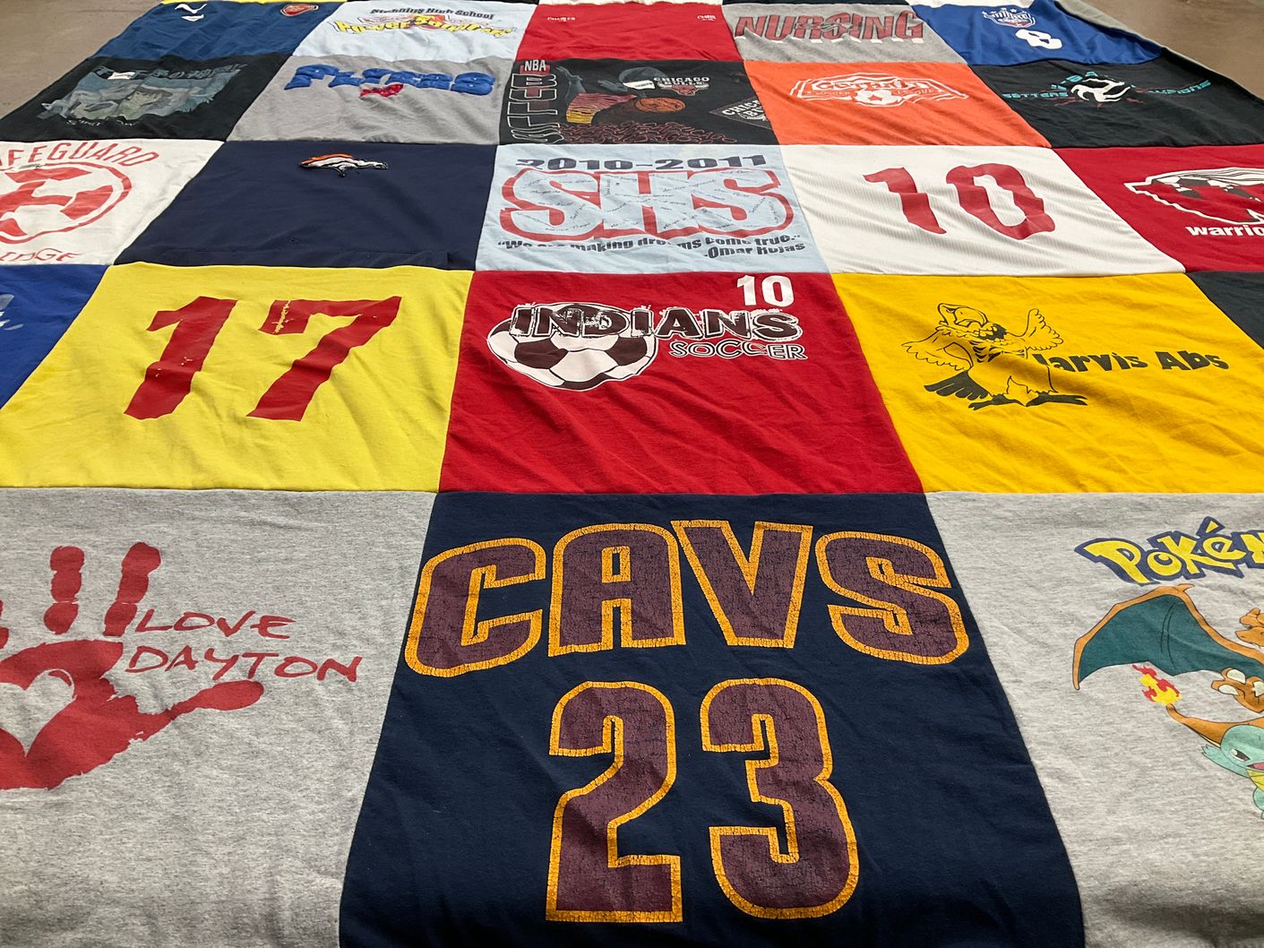 T-shirt quilt with soccer, nursing themes by Laura from OH
