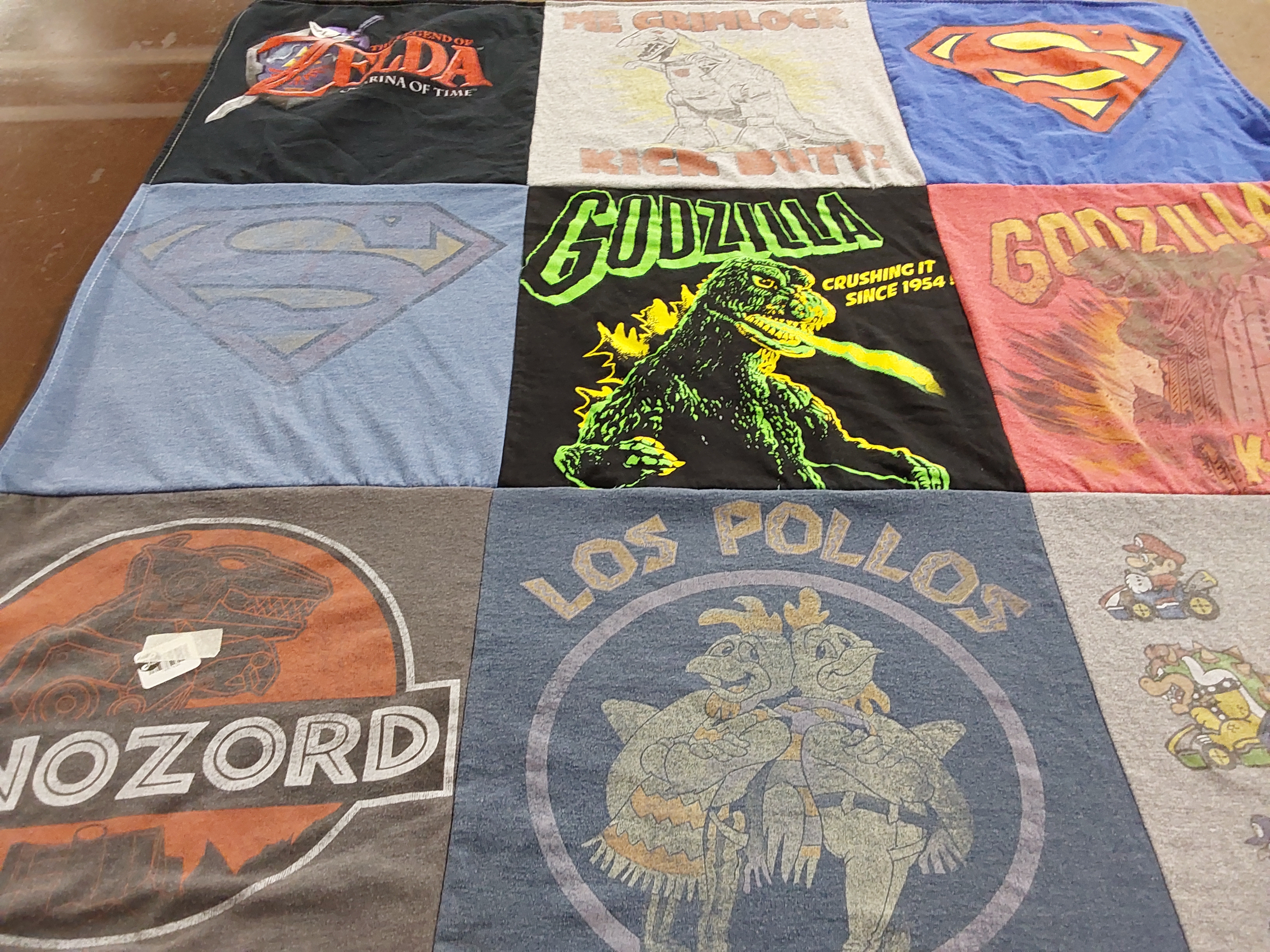 T-shirt quilt with video games, movies themes by Deborah from GA
