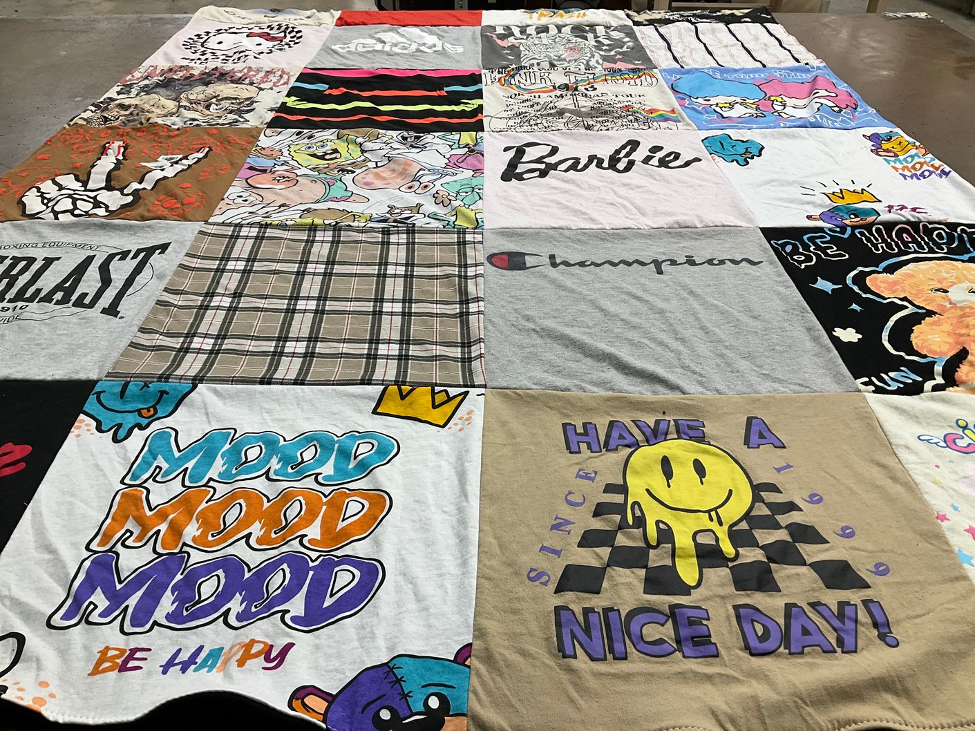 T-shirt quilt with pop culture, fashion themes by Vicky from TX