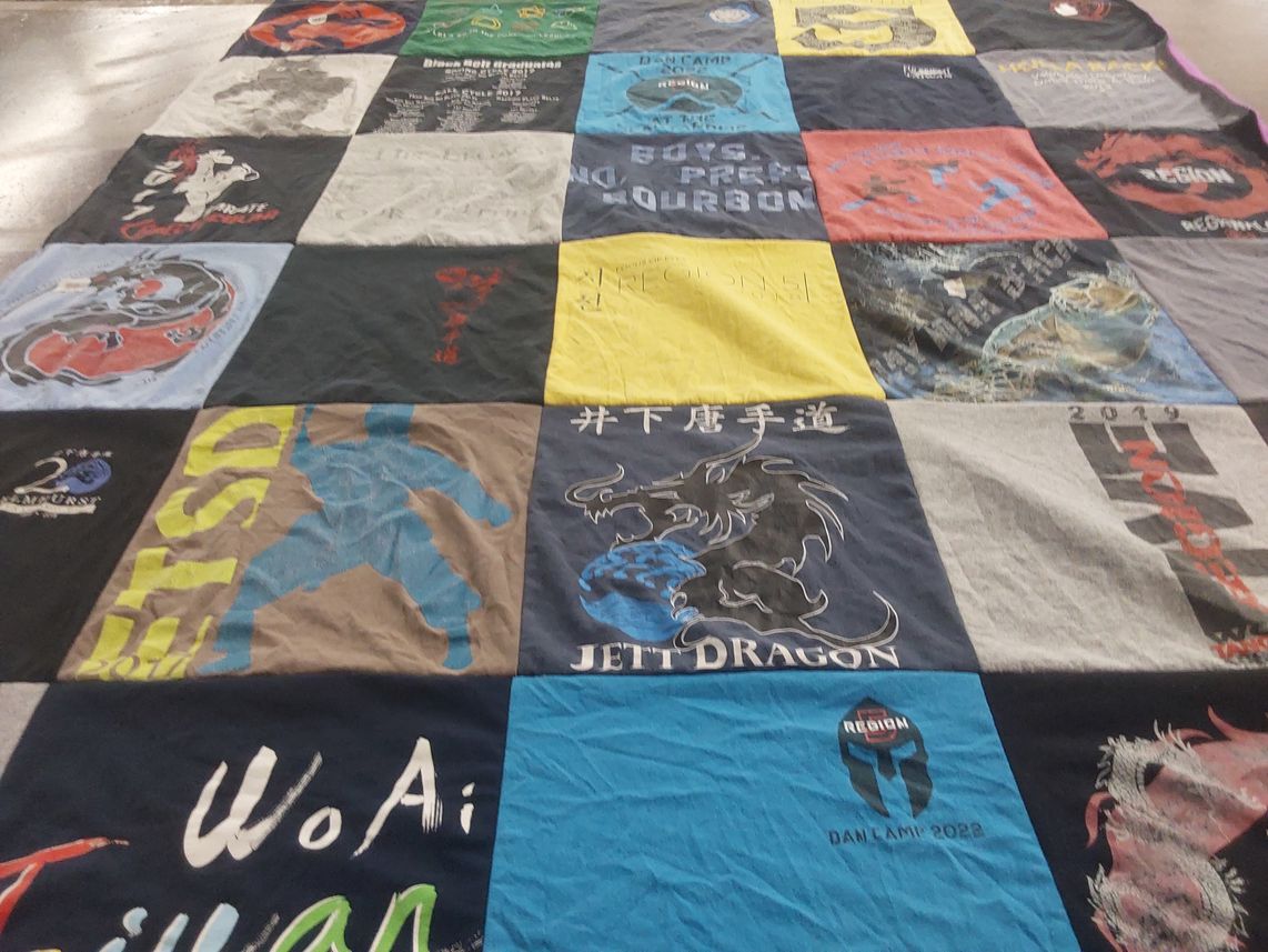 T-shirt quilt with martial arts, sports themes by Margaret from IL
