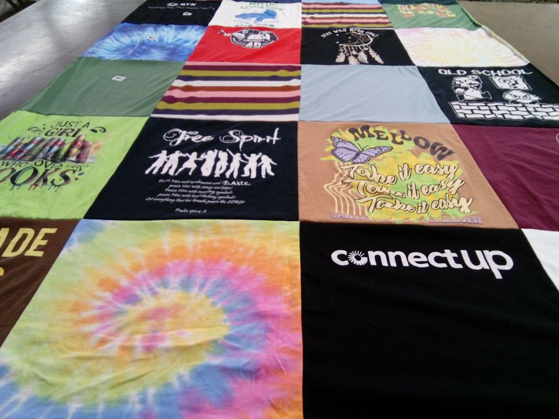 T-shirt quilt with reading, dance themes by Sarah from CT