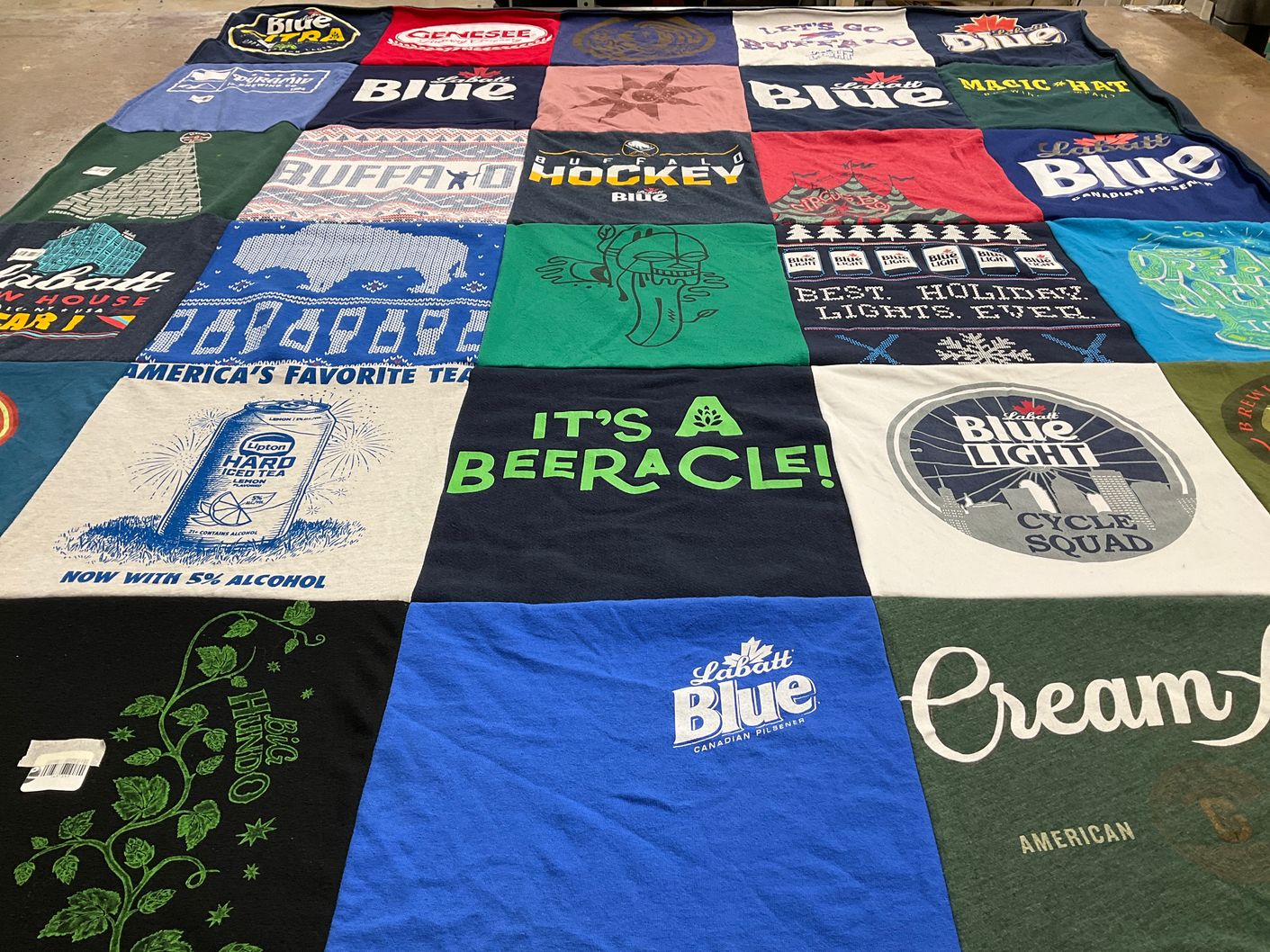 T-shirt quilt with beer, hockey themes by Kelsey from NY