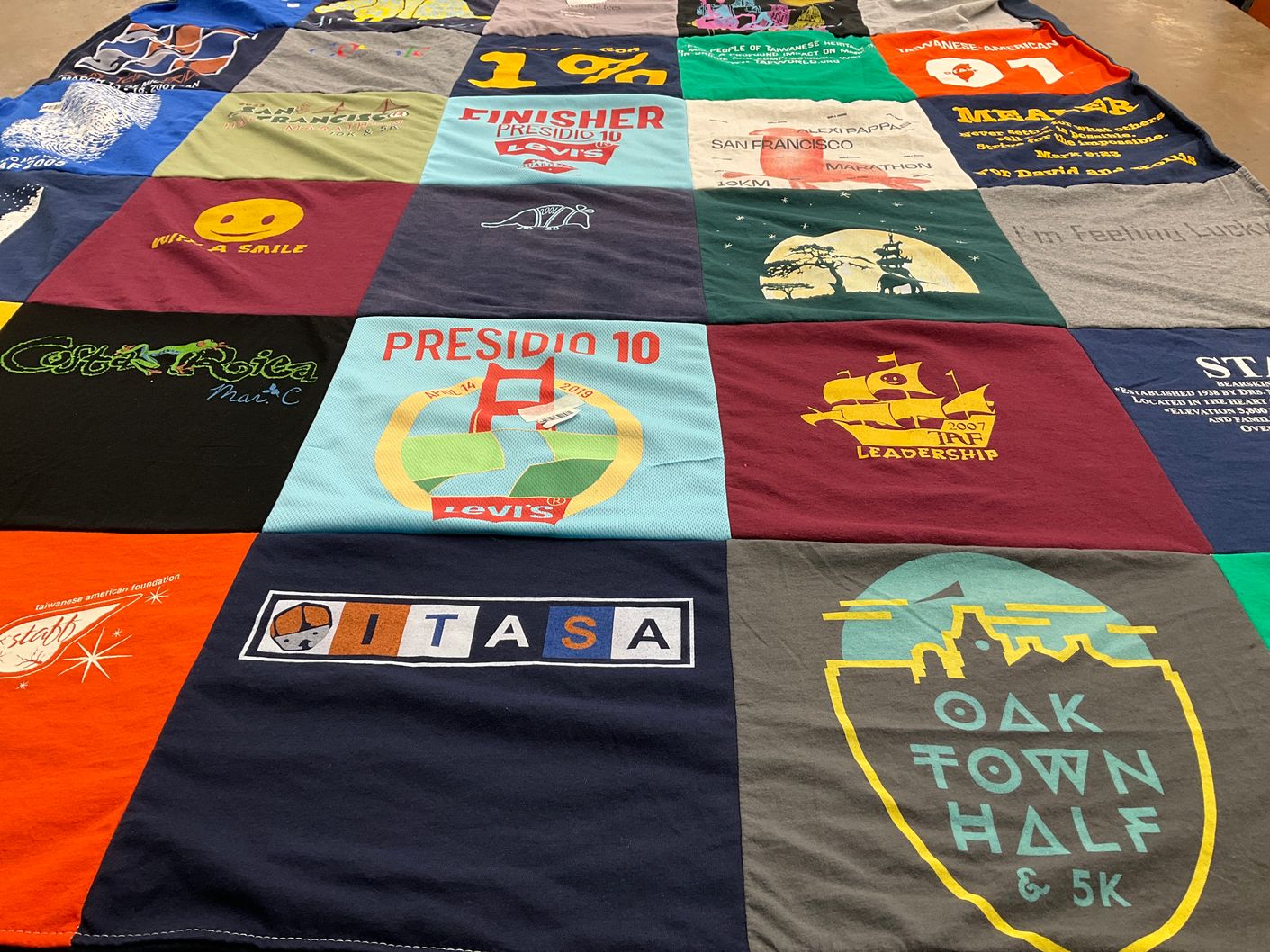 T-shirt quilt with running, marathons themes by Nancy from CA