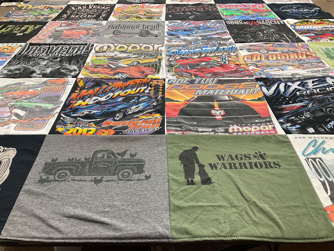 T-shirt quilt with driving, racing themes by Megan from OH