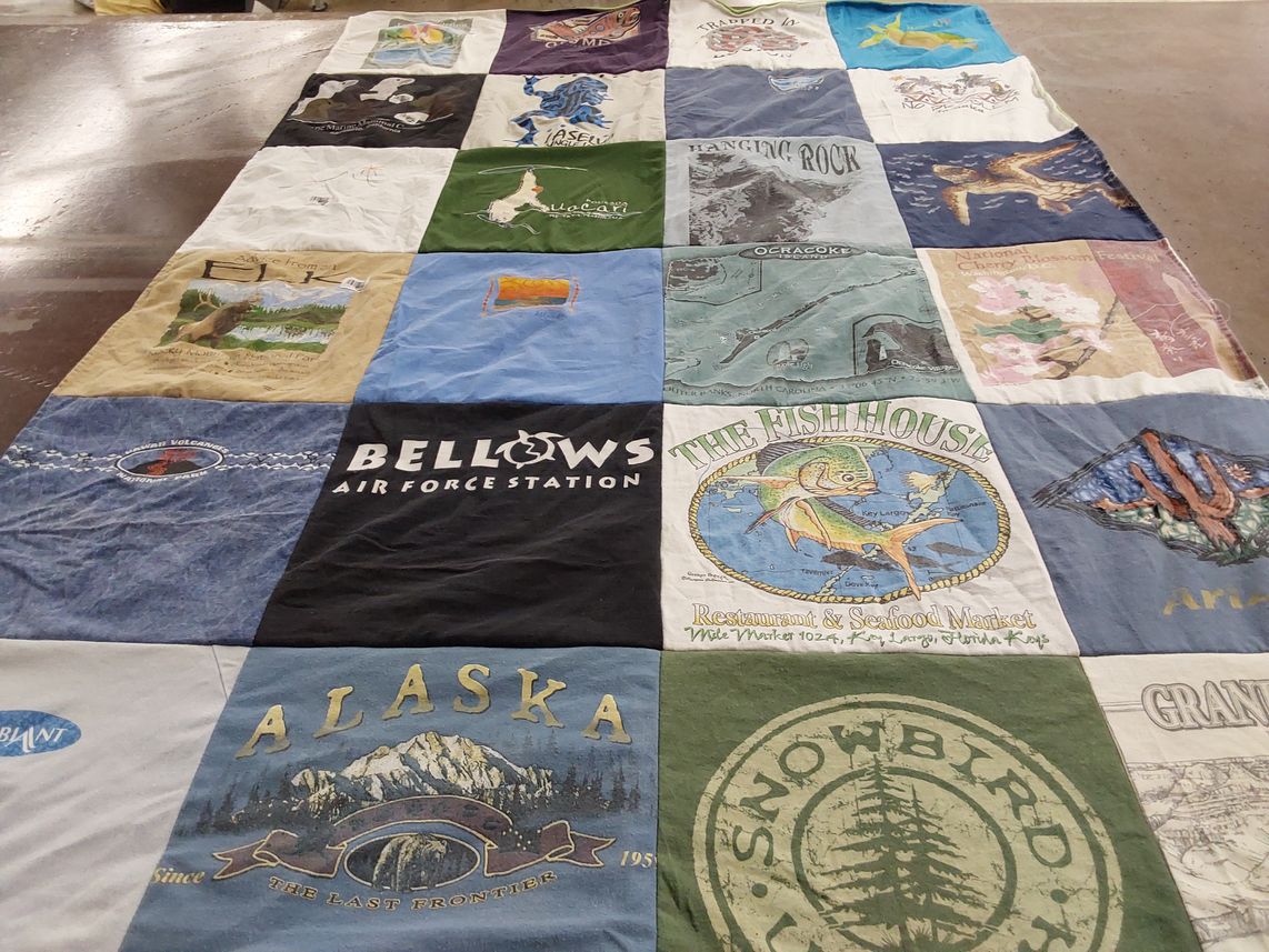 T-shirt quilt with fishing, hiking themes by Gretchen from NC