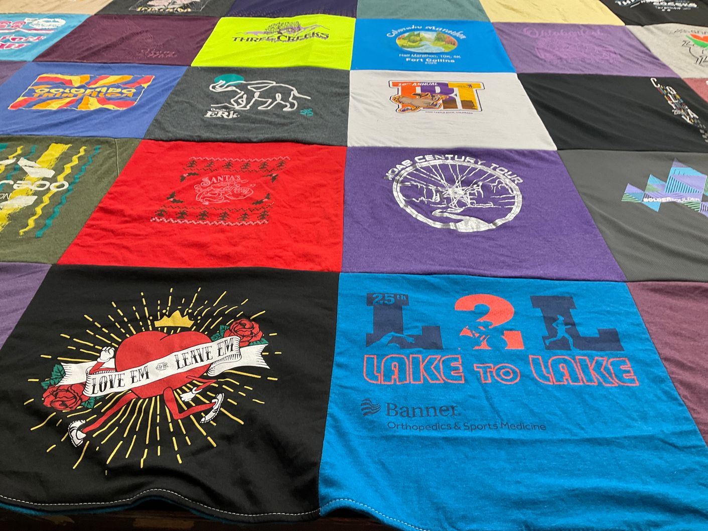 T-shirt quilt with running, art themes by Leslie from CO