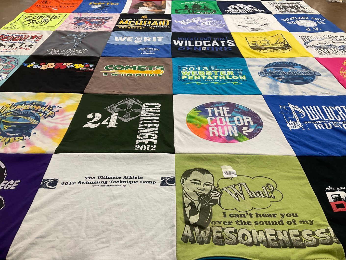 T-shirt quilt featuring wheatland chili wildcats, webster pentathlon team by SUSAN from NY