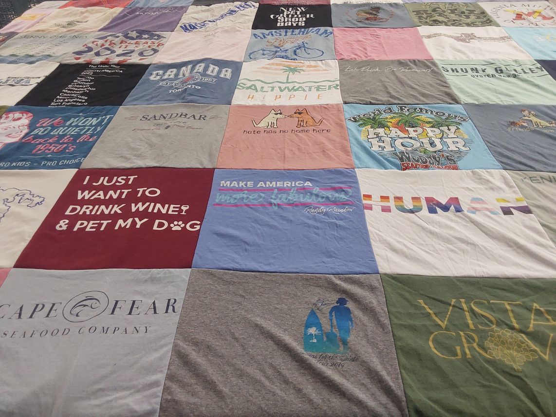 T-shirt quilt with travel, food themes by Carolyn from GA