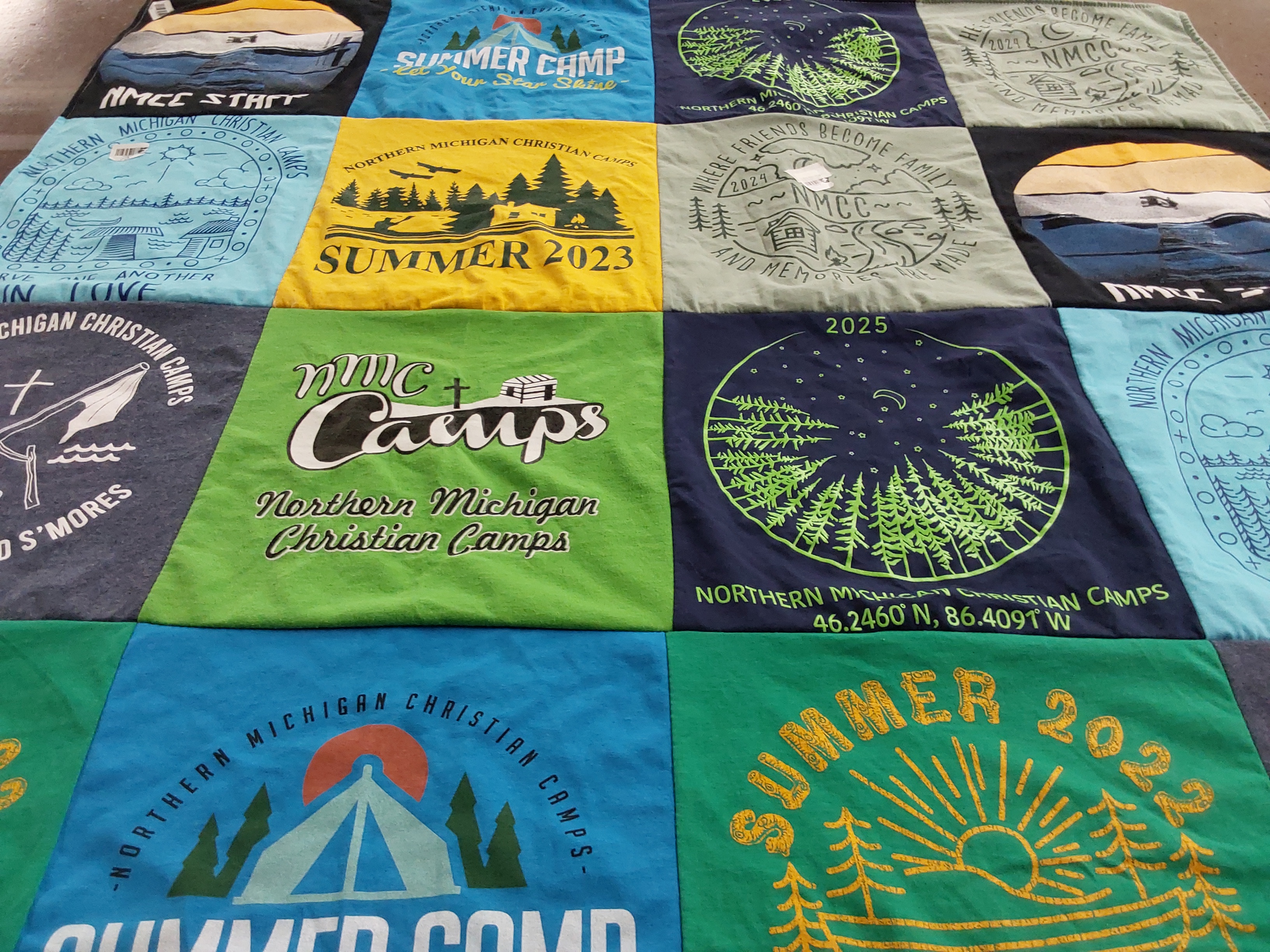 T-shirt quilt with camping, outdoor activities themes by Brynn from WI