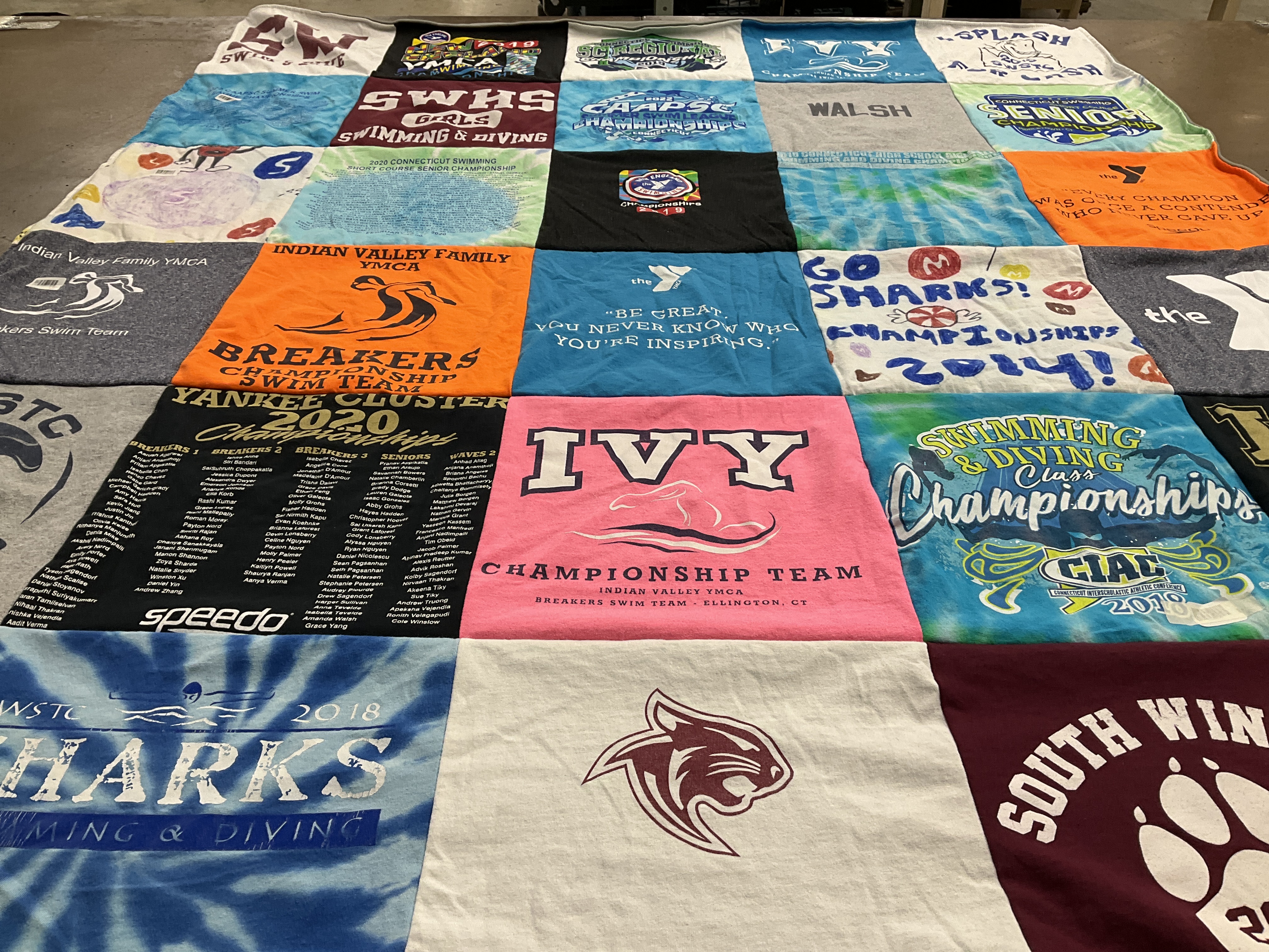 T-shirt quilt featuring ivy championship team, breakers swim team by Andrea from CT