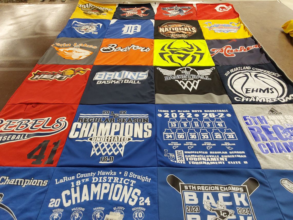 T-shirt quilt featuring lareau county hawks, win lakes heat by Dan from KY