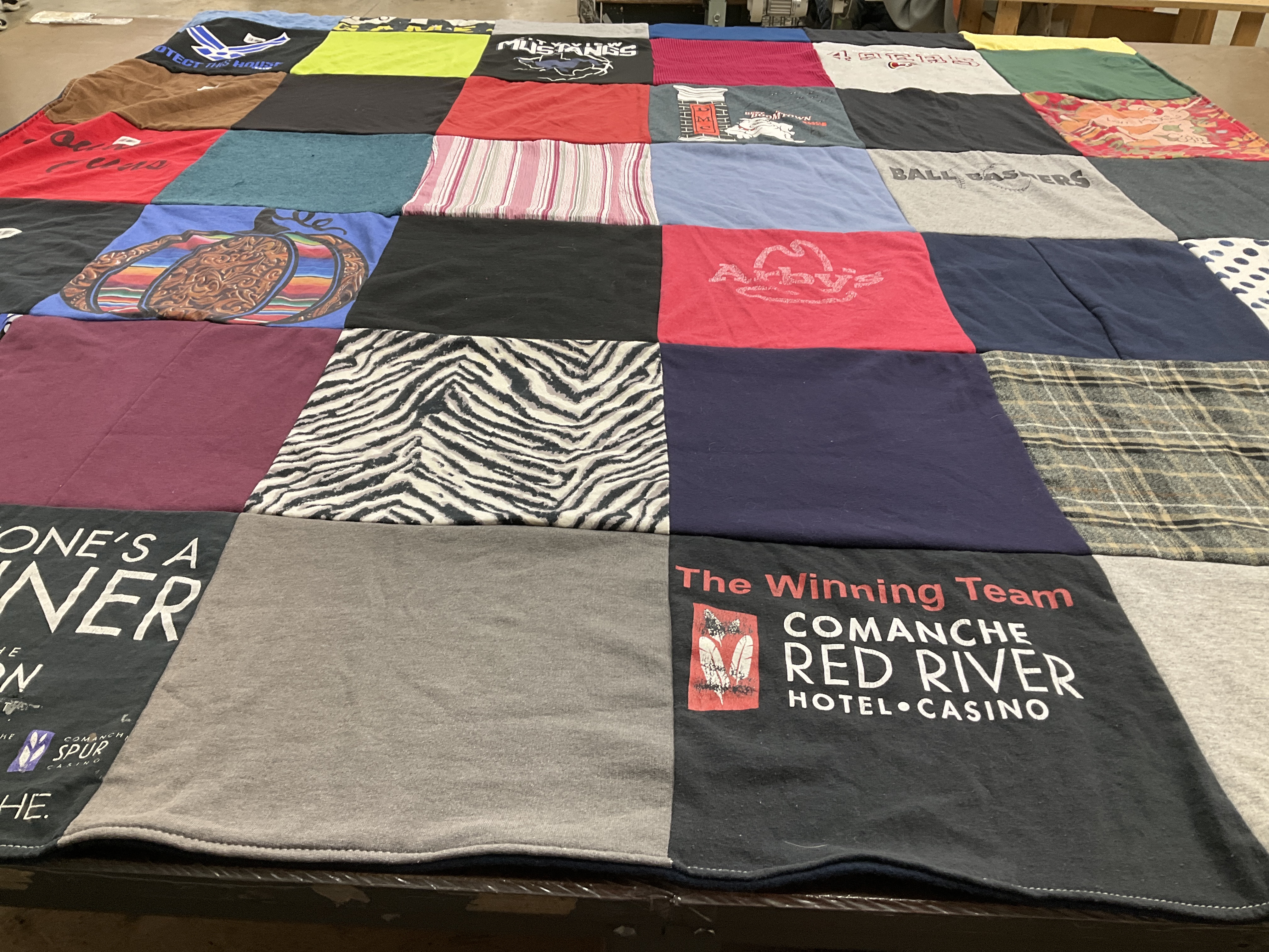 T-shirt quilt with sports themes by john from TX