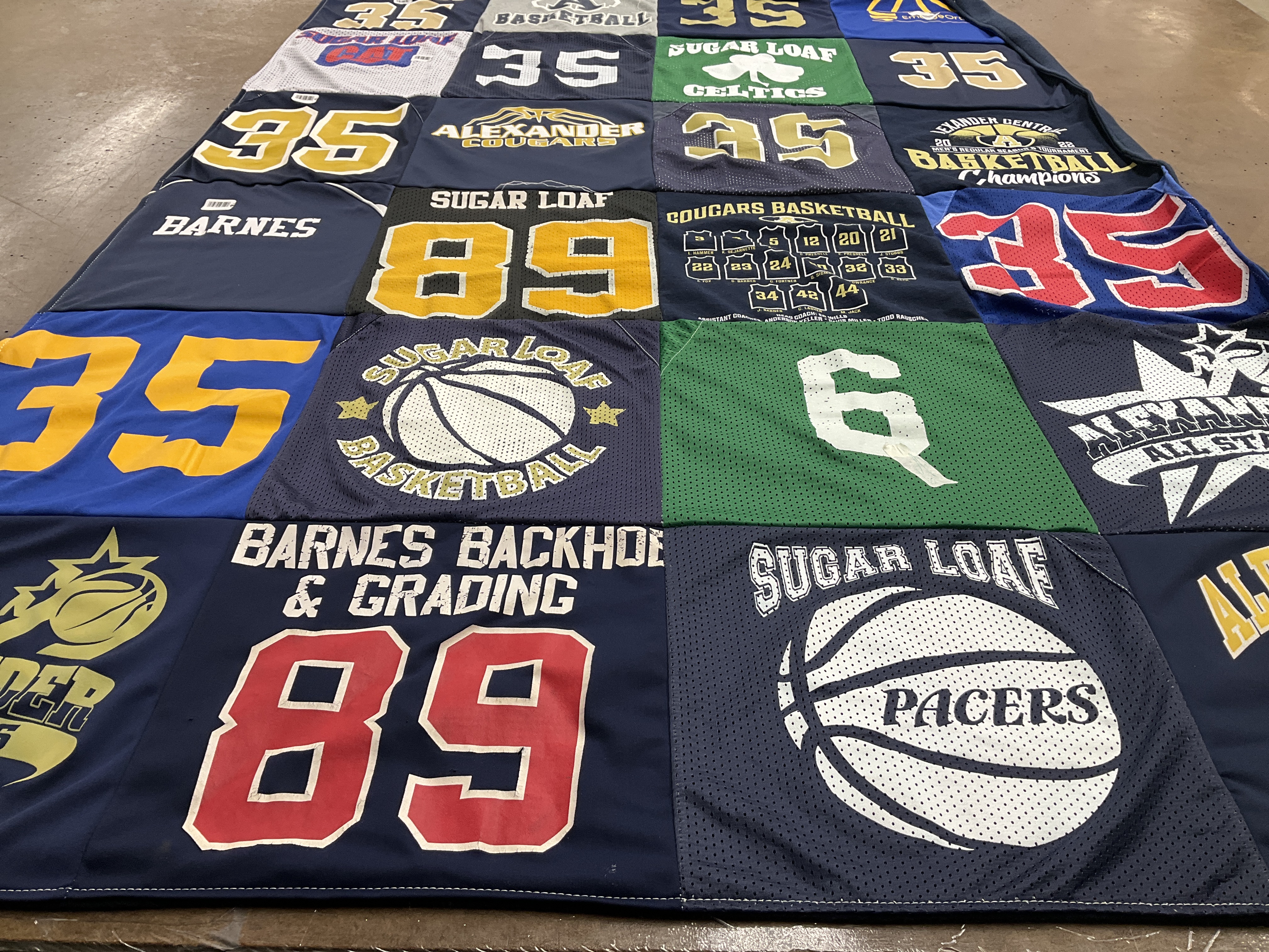 T-shirt quilt featuring sugar loaf cougars basketball, sugar loaf pacers by Kisha from NC