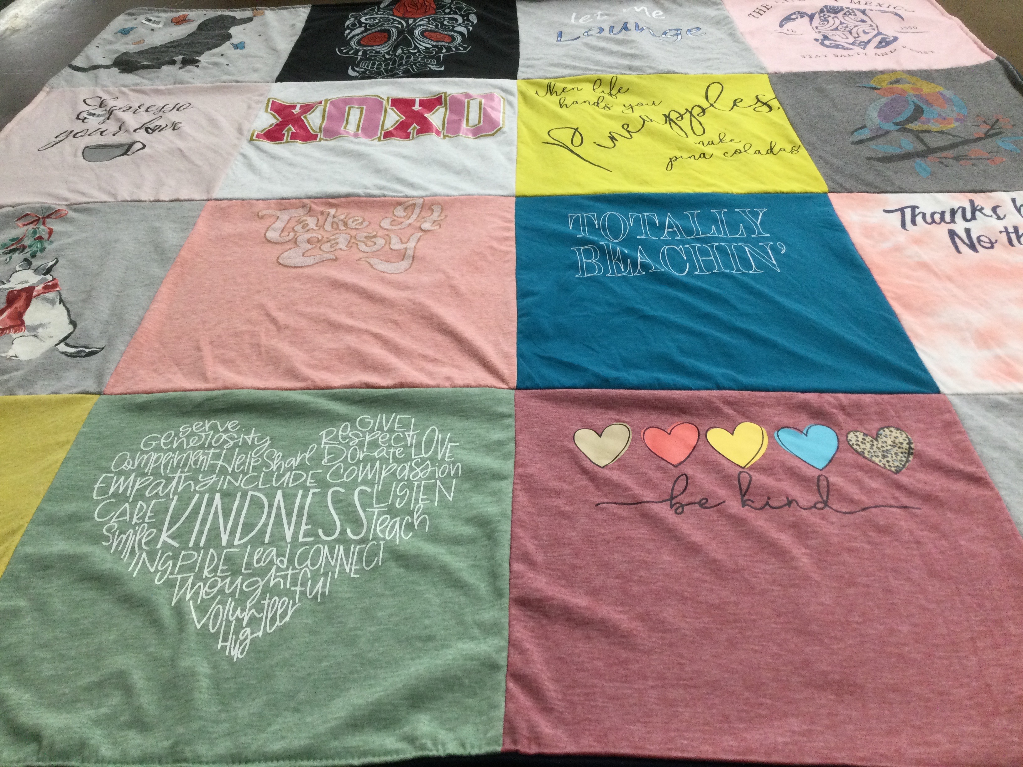 T-shirt quilt with beach, kindness themes by Julie from TX