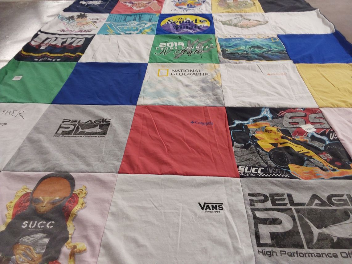 T-shirt quilt with ocean, fishing themes by Karen from FL