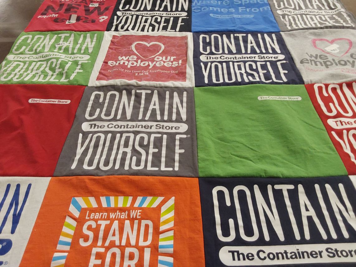 T-shirt quilt with organization, storage themes by Peggy from IN