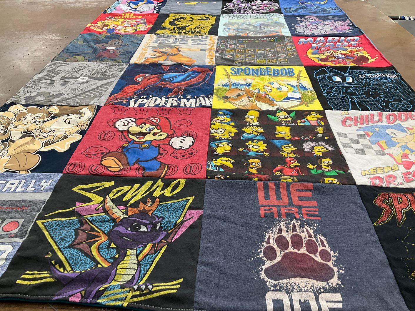 T-shirt quilt with cartoons, video games themes by Bruce from OR