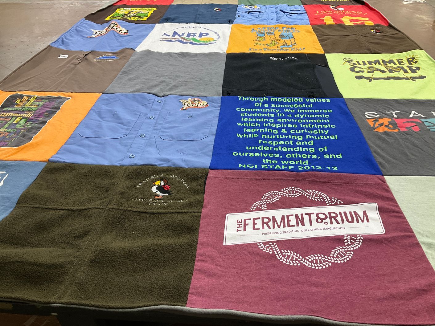 T-shirt quilt with education, learning themes by Natalie from WI