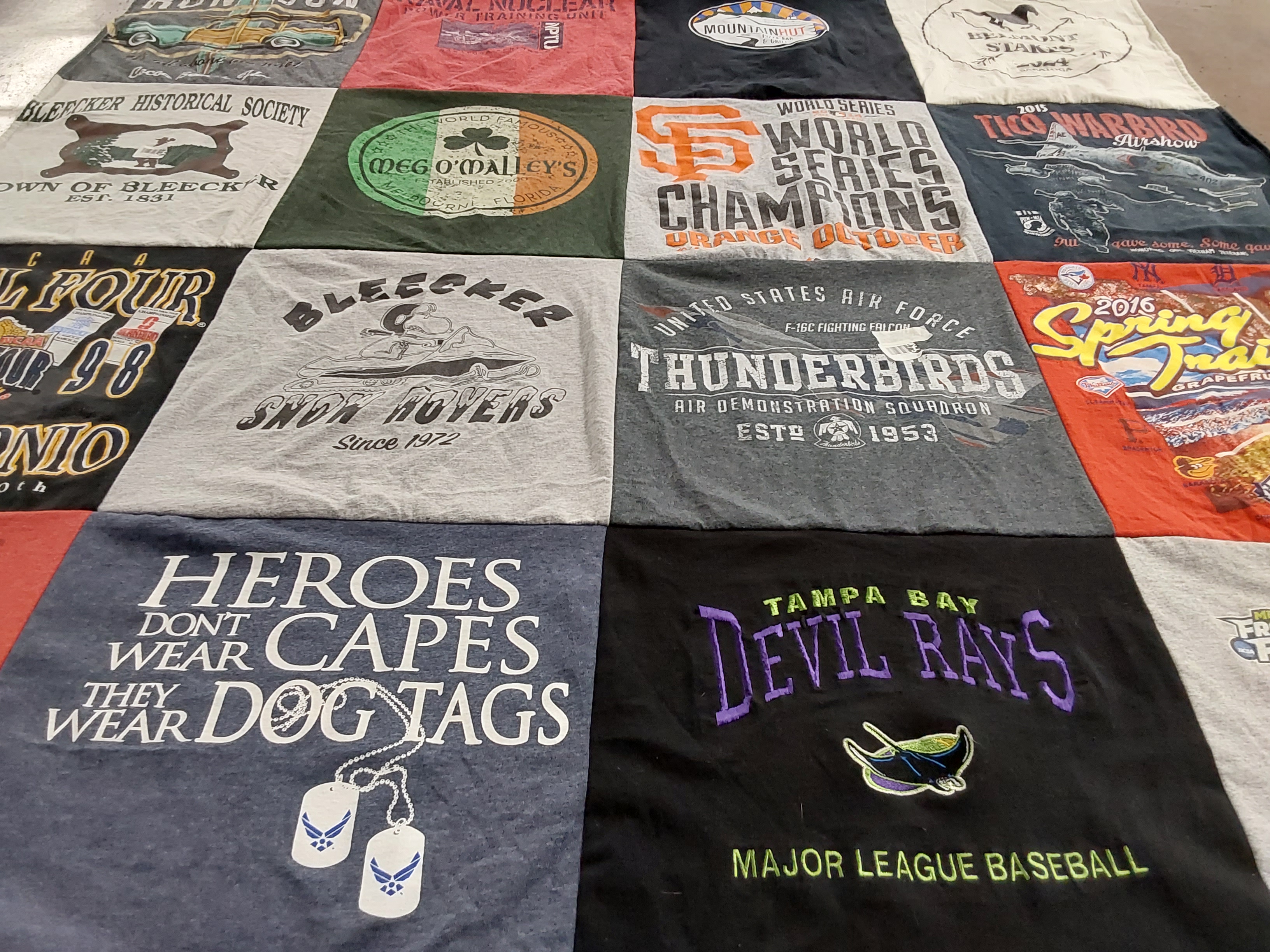 T-shirt quilt with sports, military themes by dennis from FL