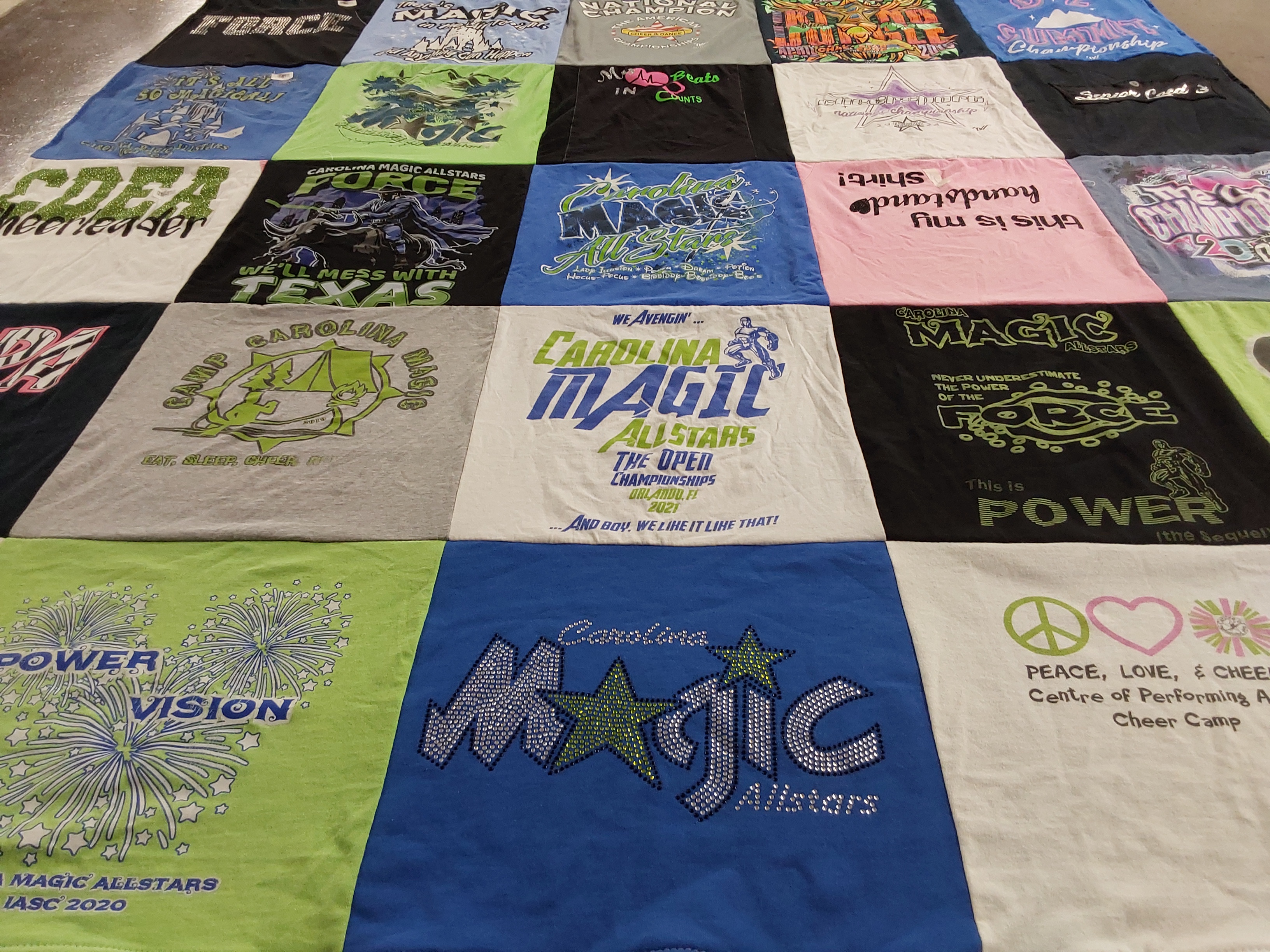 T-shirt quilt with cheerleading, performing arts themes by Melissa from NC