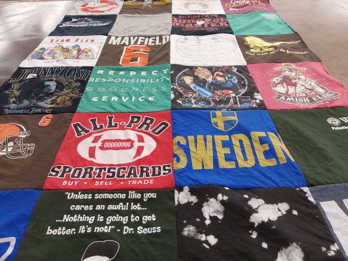 T-shirt quilt with music, sports themes by Sasha from OH