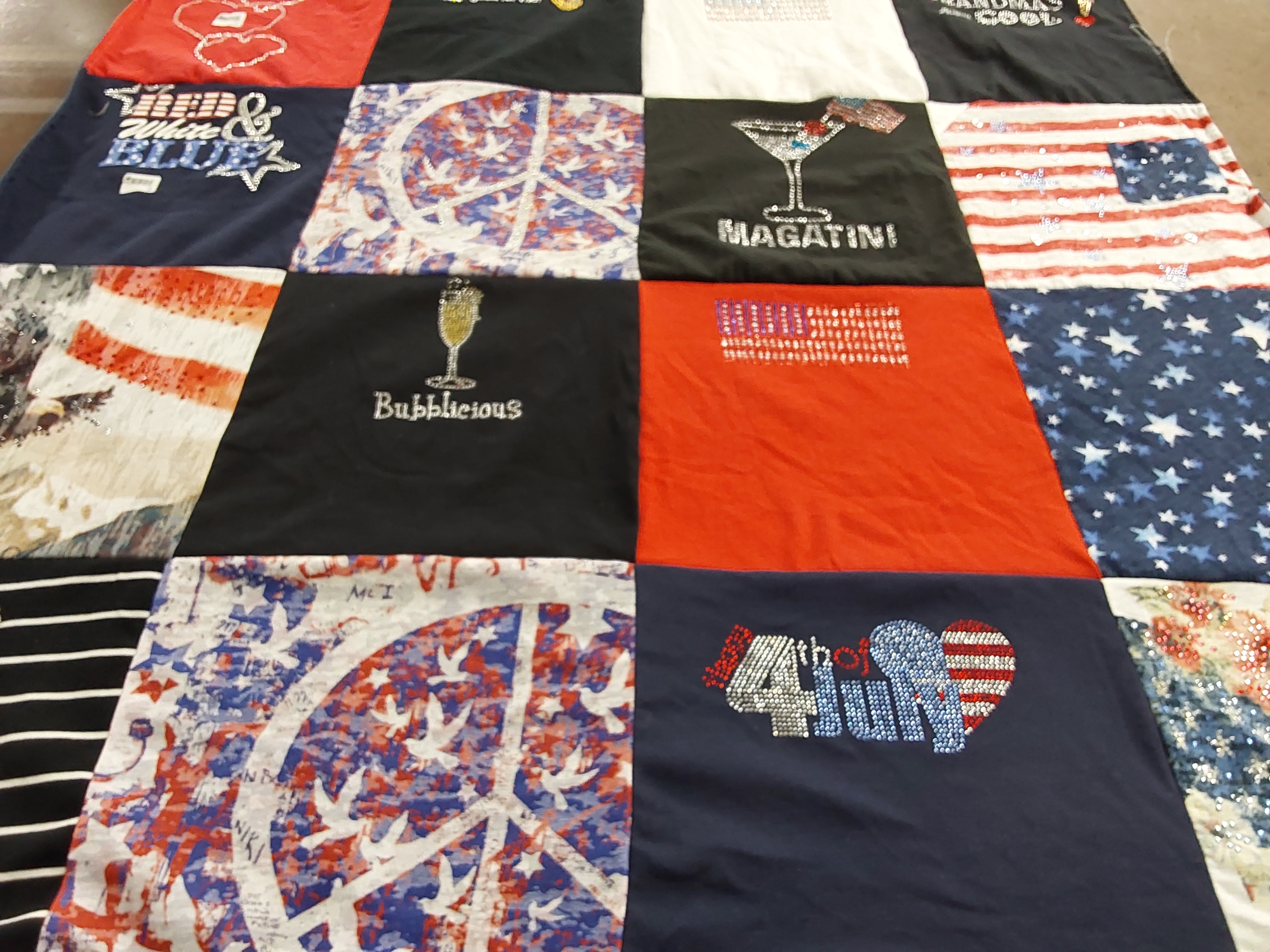 T-shirt quilt with patriotic, celebration themes by leslie from CA