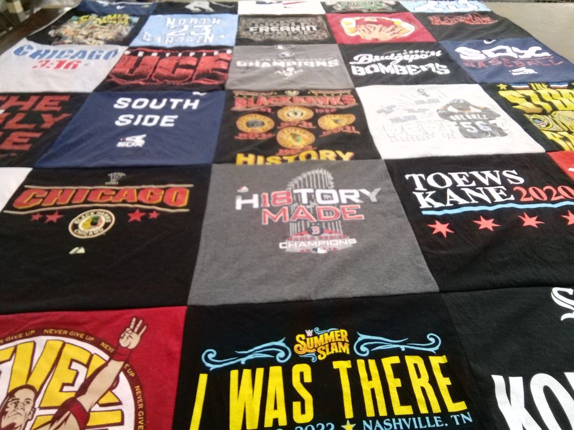 T-shirt quilt with sports, wrestling themes by Joyann from IL