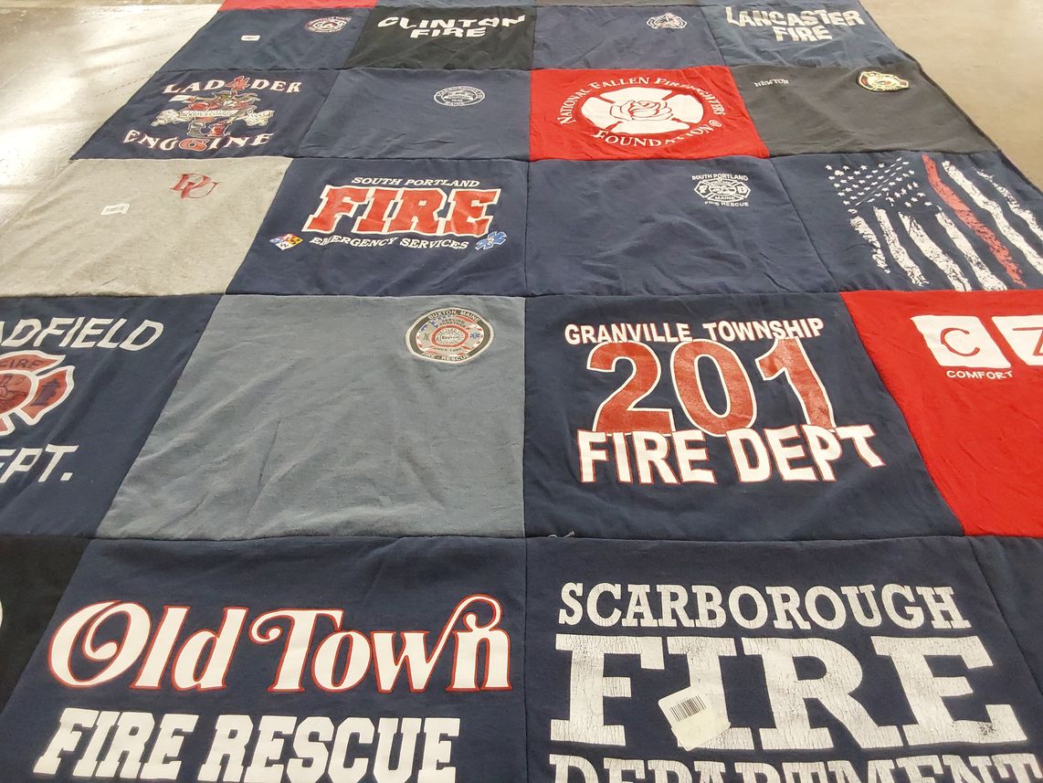 T-shirt quilt with firefighting, emergency services themes by Maxwell from ME