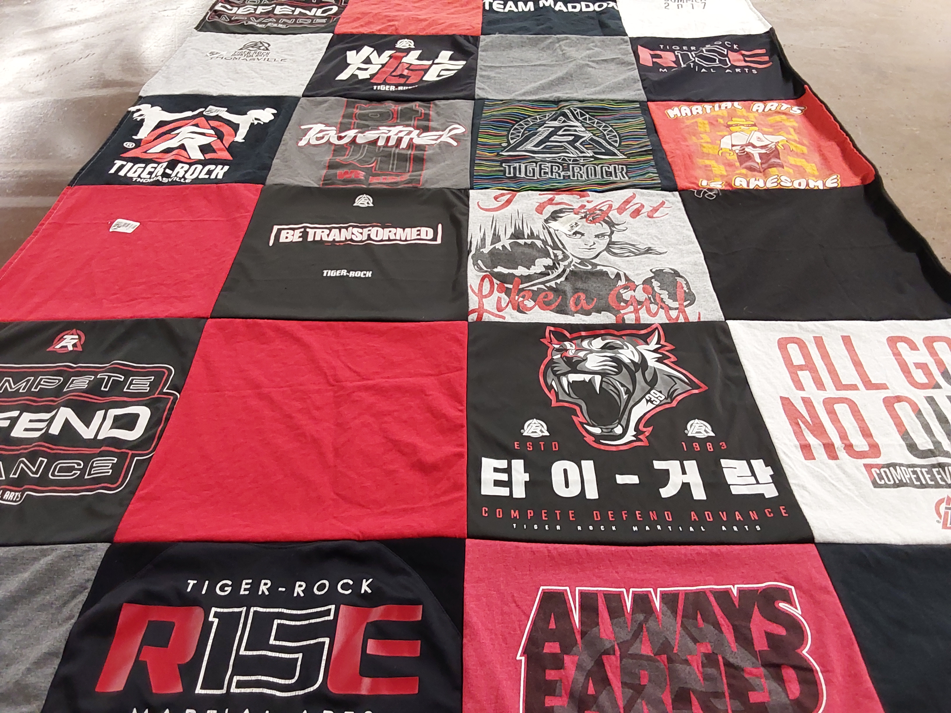 T-shirt quilt with martial arts, fitness themes by Mandy from GA