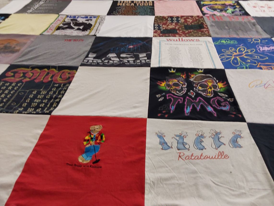 T-shirt quilt with music, art themes by Nicole from TX