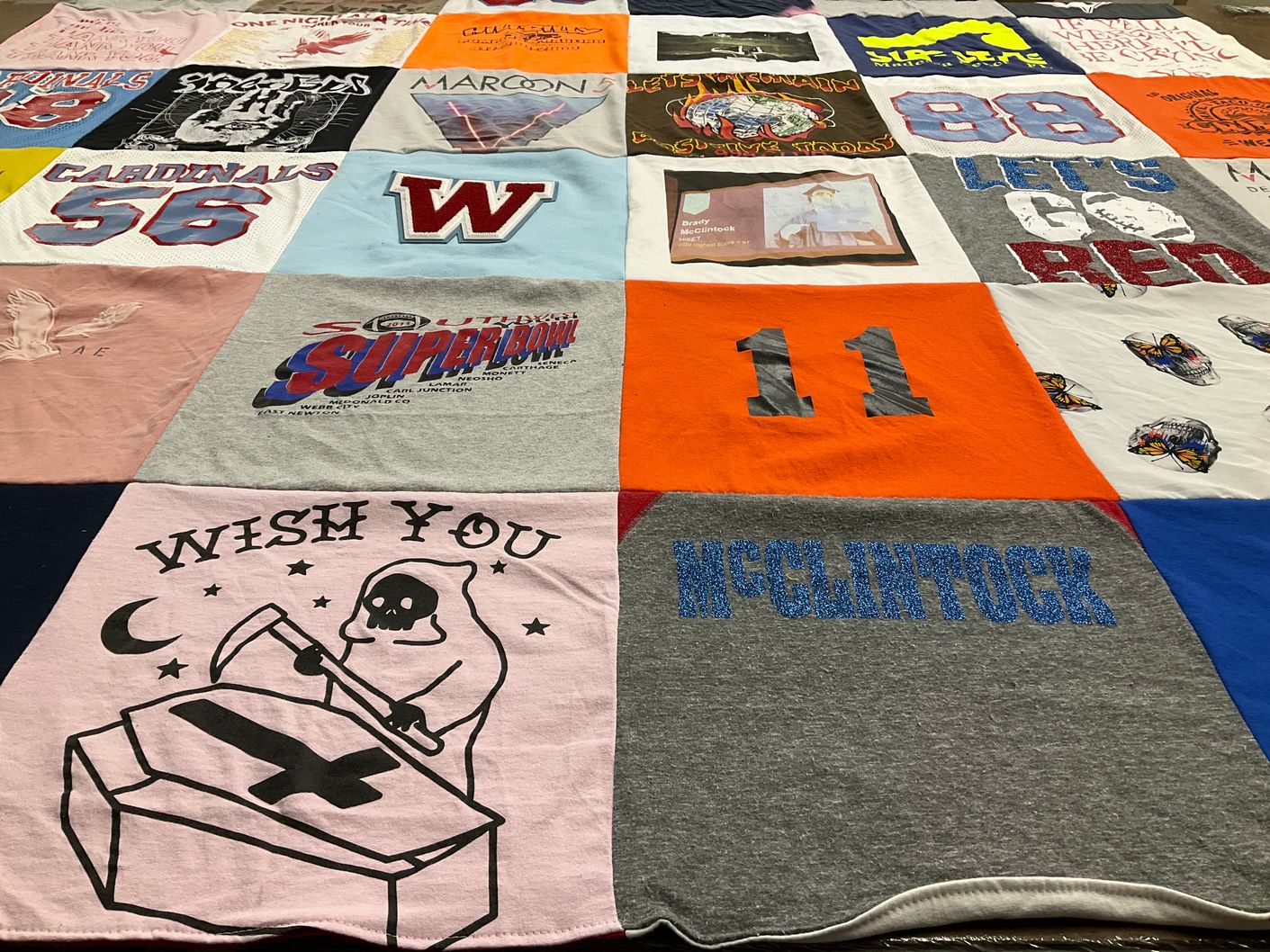 T-shirt quilt featuring cardinals by Ashley from MO