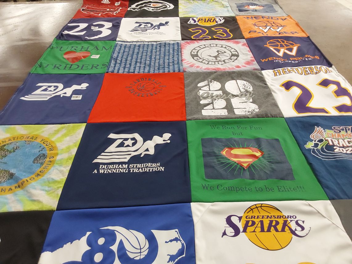 T-shirt quilt with track and field, youth sports themes by Joi L. from NC
