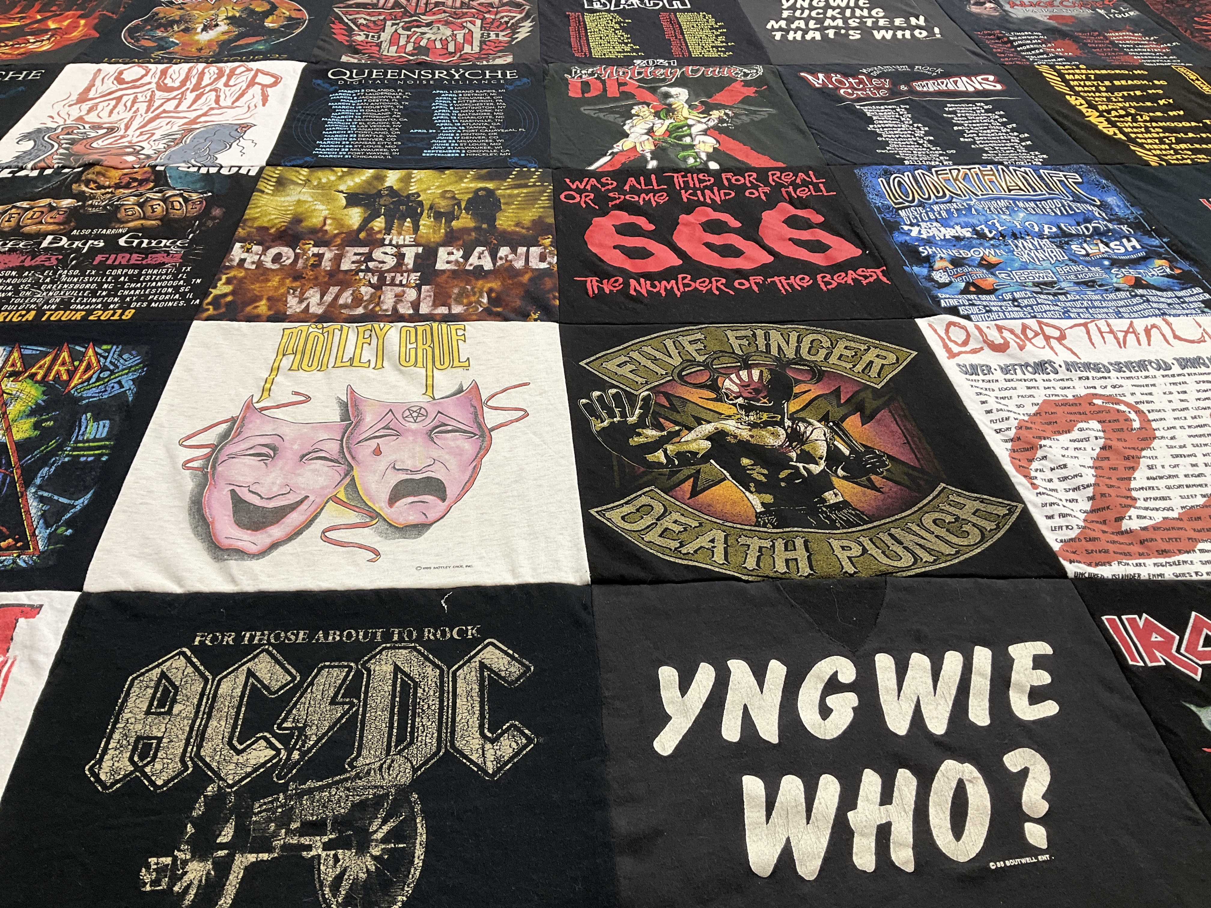 T-shirt quilt with rock music, heavy metal themes by Dorothy from KY