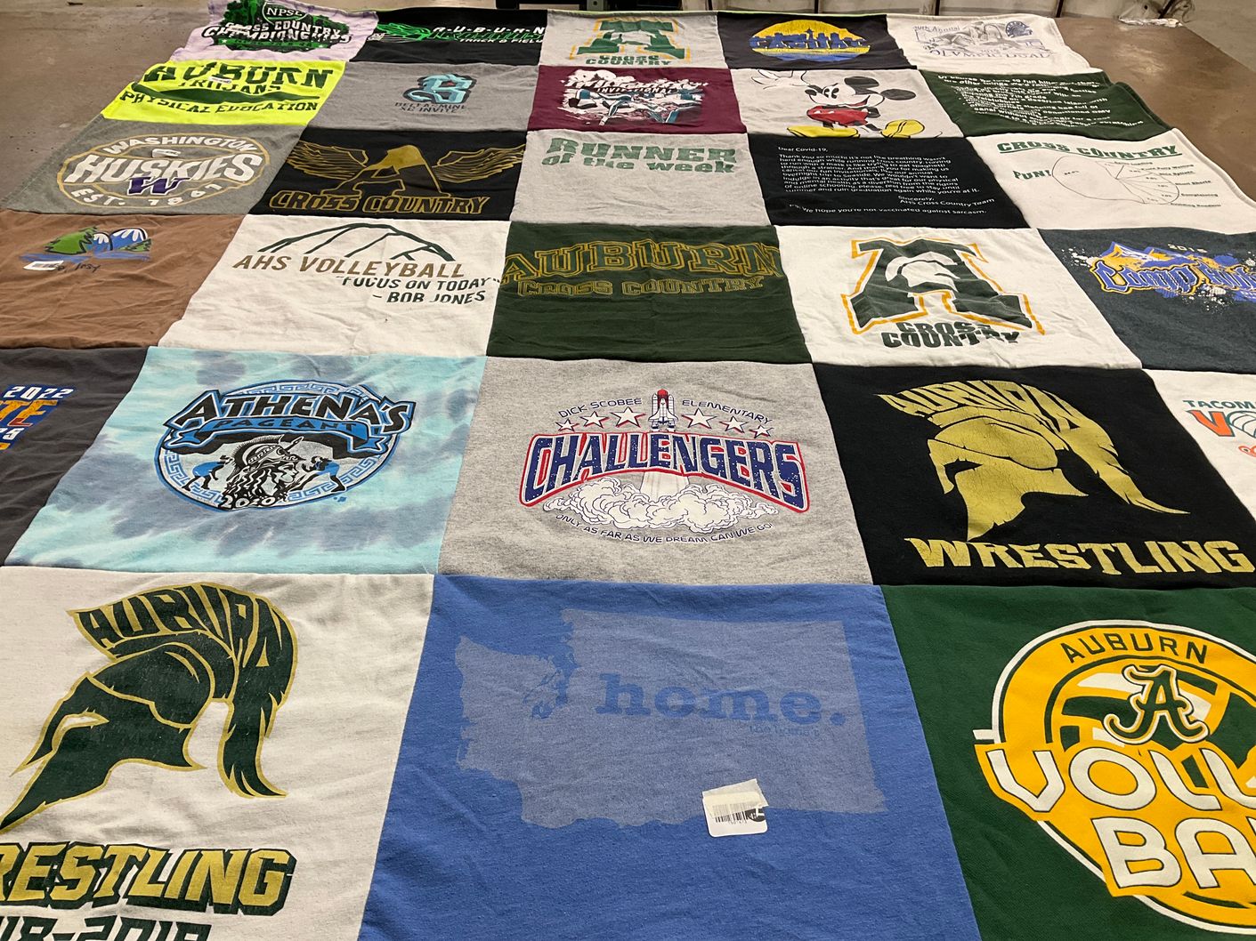 T-shirt quilt featuring auburn high school volleyball, washington high school huskies by Jeannie from WA