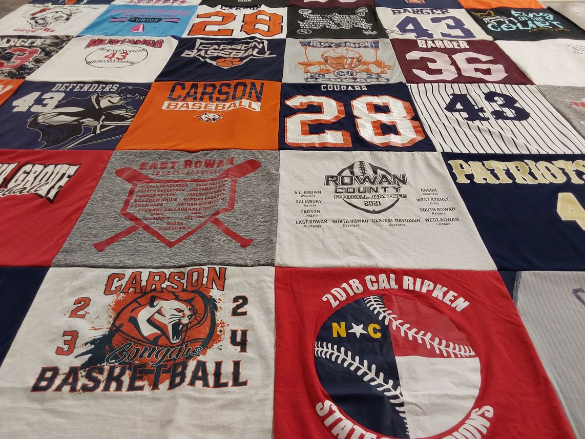 T-shirt quilt featuring east rowan mustangs, carson cougars by Kerry from NC