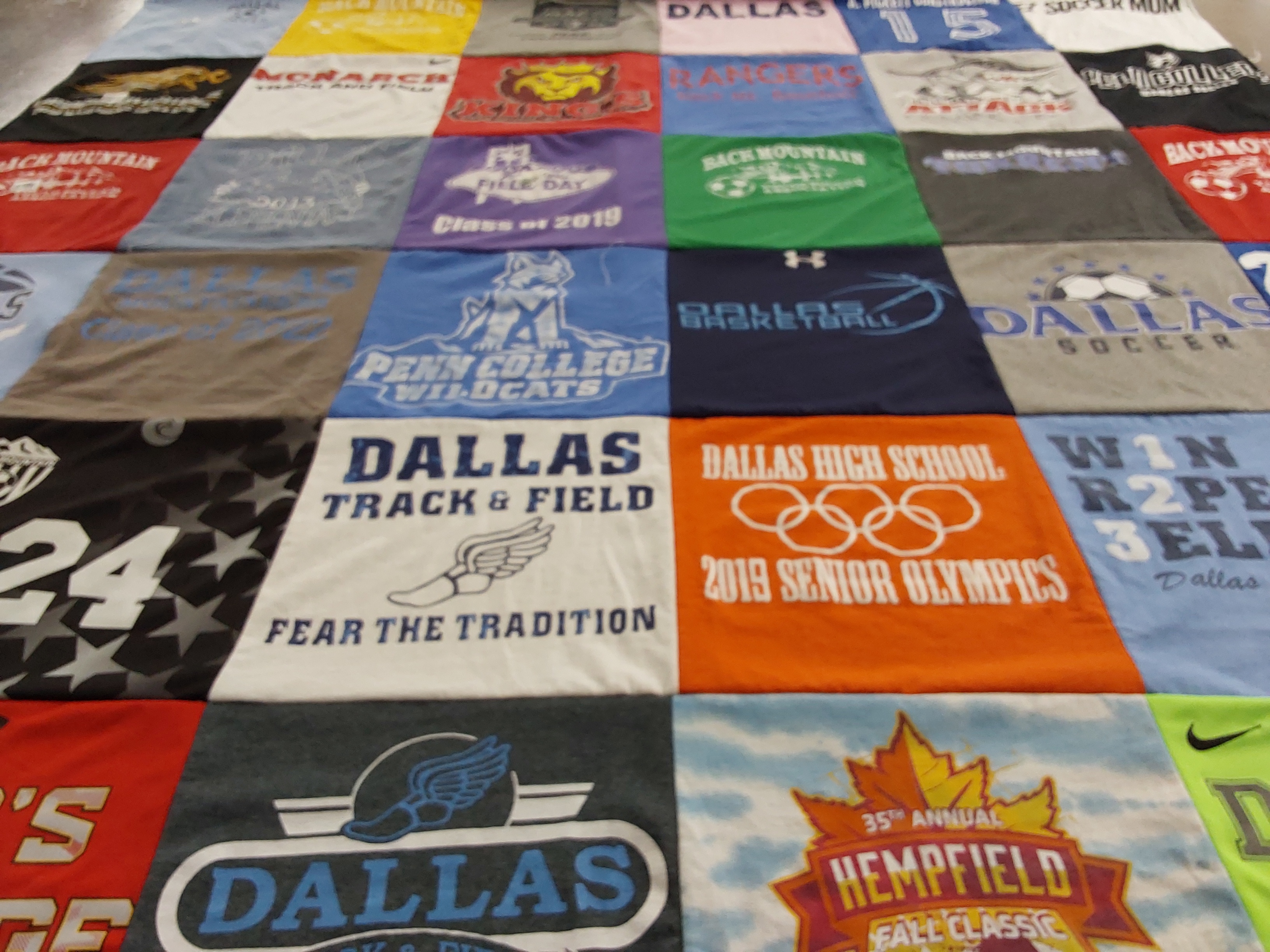 T-shirt quilt featuring dallas track and field, dallas basketball by James from PA