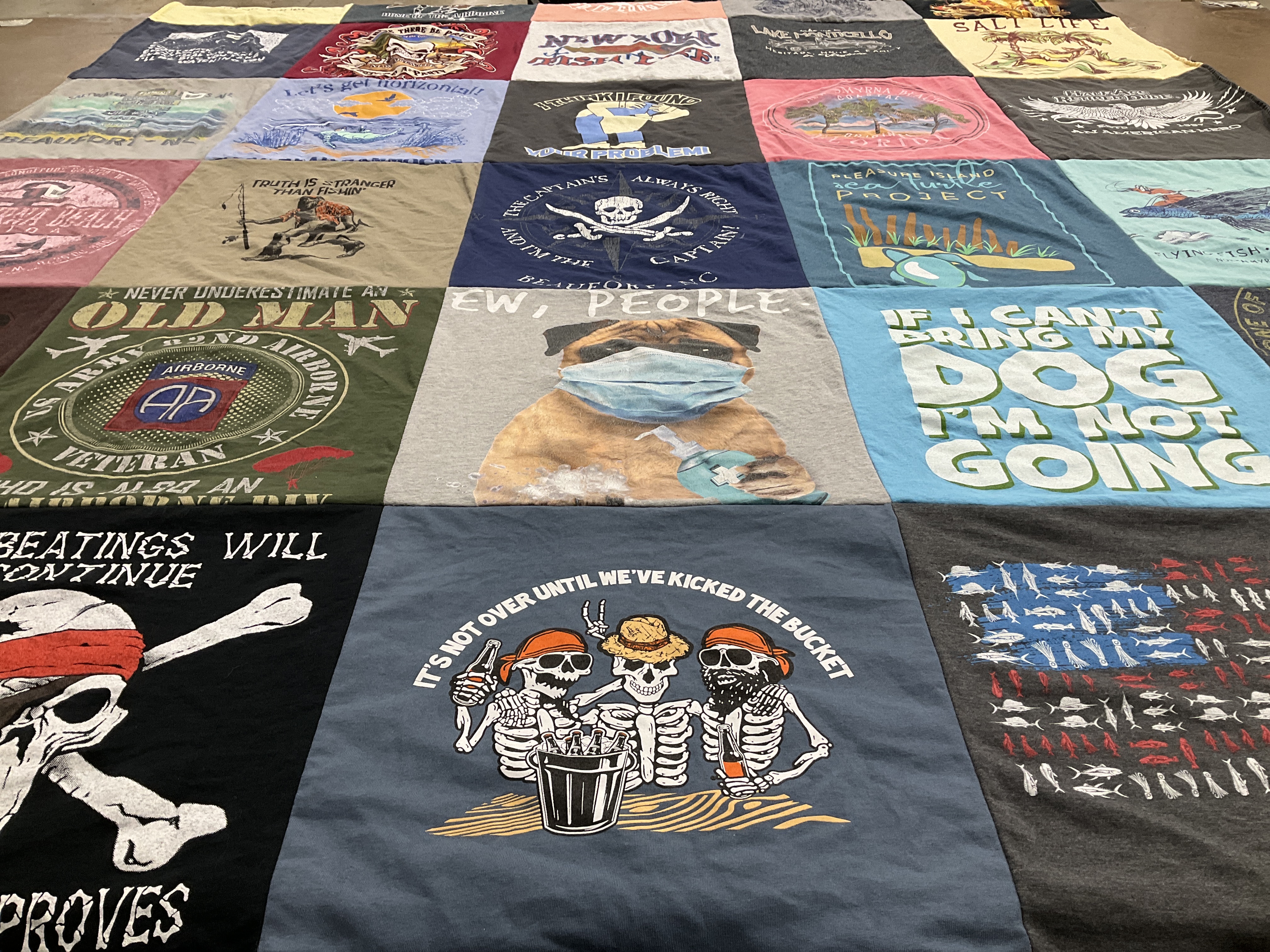 T-shirt quilt with veterans, dogs themes by Sandra from NC