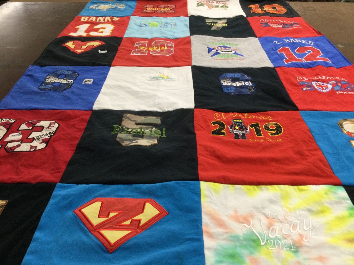 T-shirt quilt with sports, family themes by Logan J from MO