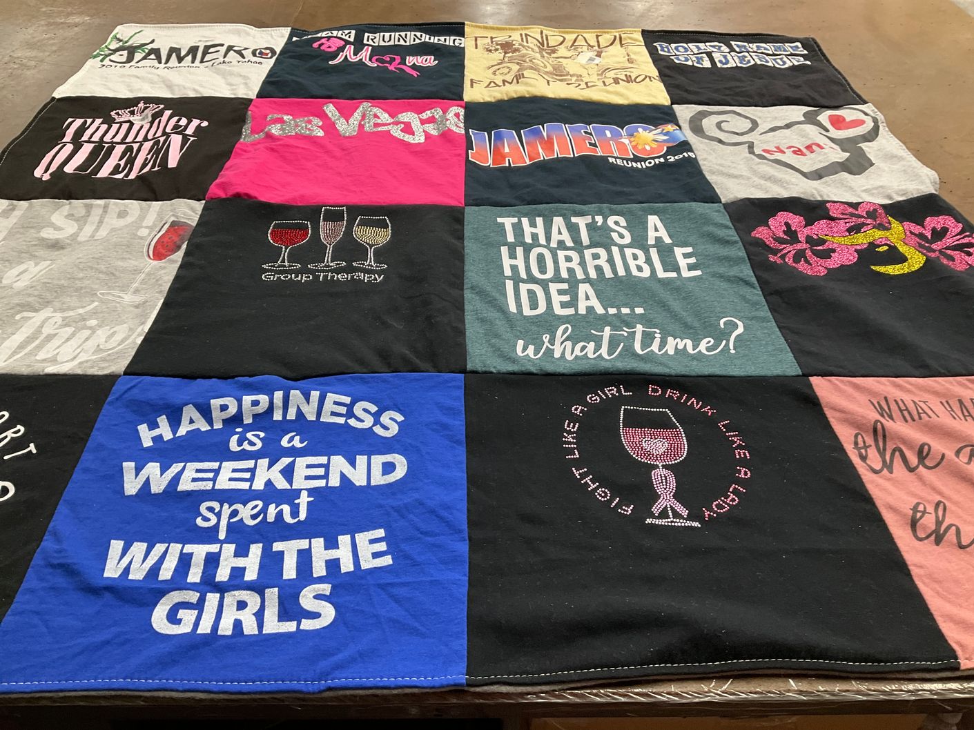 T-shirt quilt with travel, drinking themes by Rebecca from LA